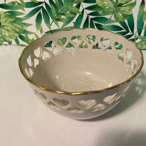 Lenox vintage nut bowl with heart cutouts and rose bottom.